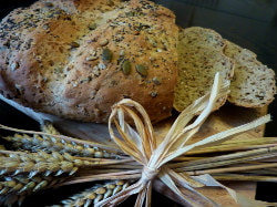 Home-baked loaf, picture link to ‘Bread for the Journey’ Blog.