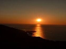 Sunset over the sea, picture link to ‘Experiencing God’s Presence’ page.
