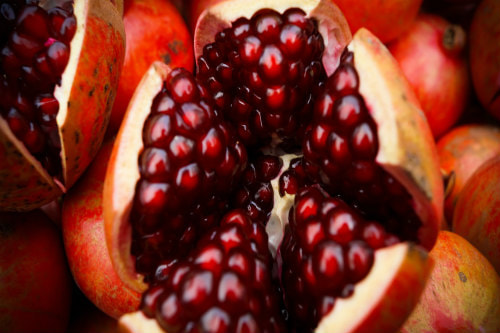Close-up of the inside of a pomegranate, illustrating a ‘fruitful life’.
