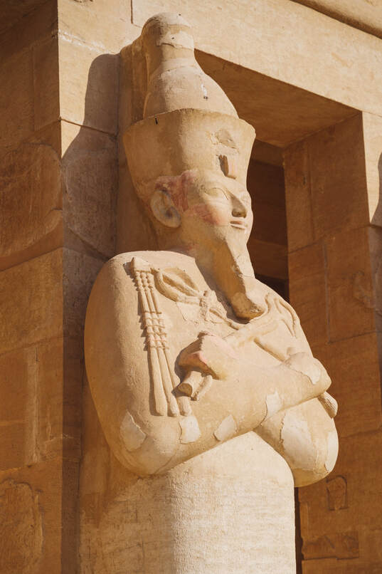 Stone statue of Egyptian Pharoah.
