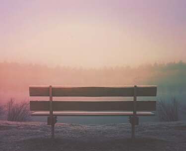 Empty bench with sunrise behind, illustrating the page title, ‘Spirit-led Refreshment: The Rhythm of Sabbath’.
