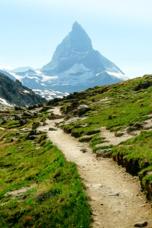 Alpine path leading towards the Matterhorn.